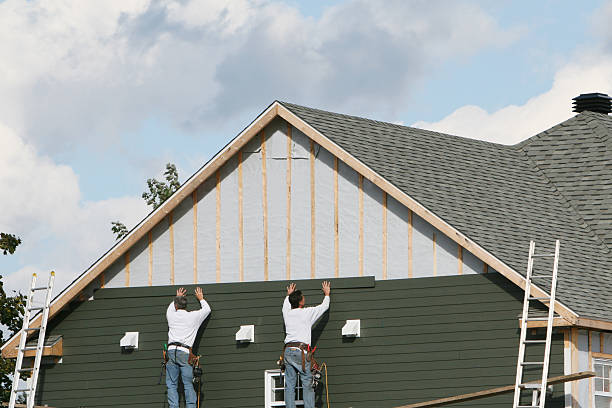 Professional Siding Replacement technician working in New Manchester, WV